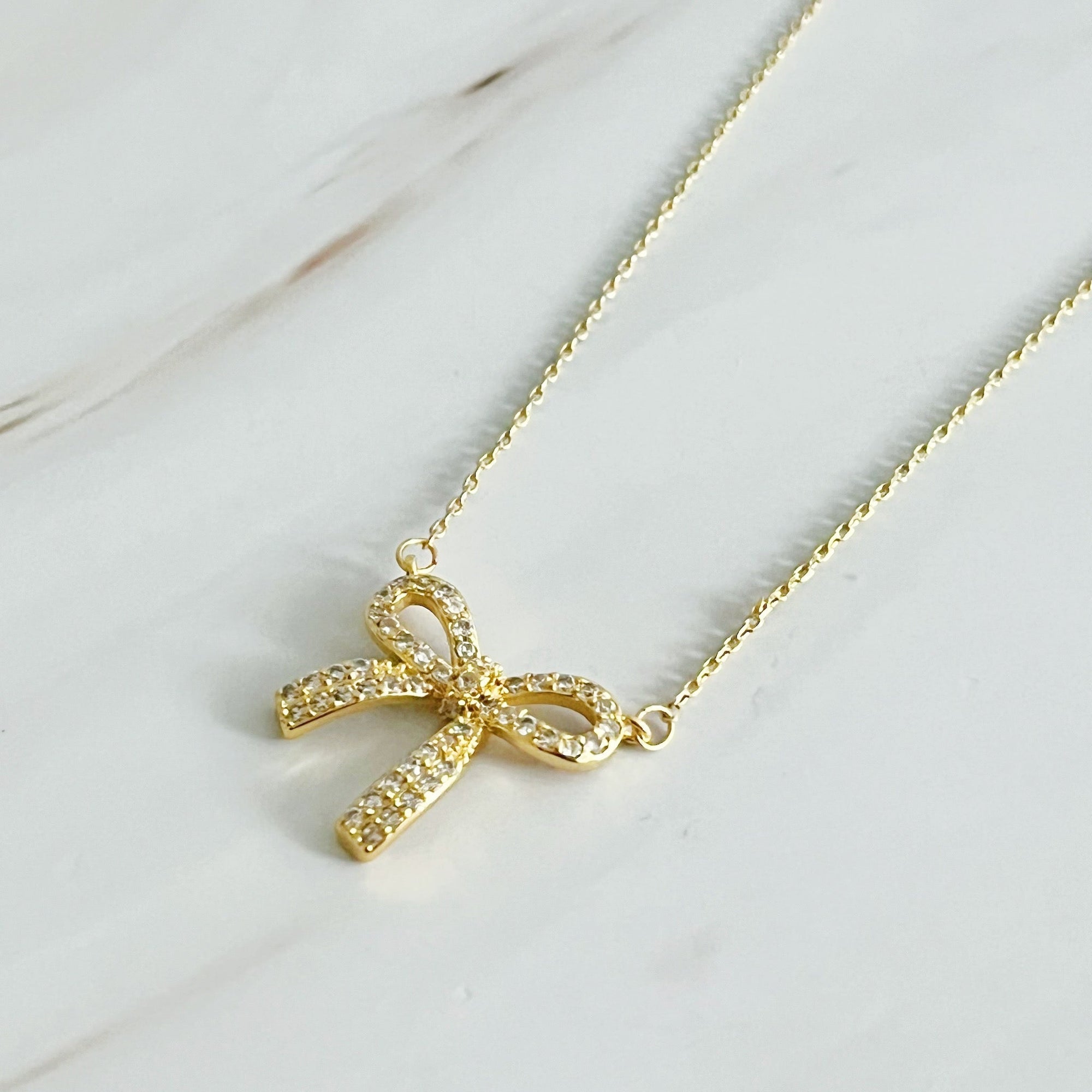 Simply Shine Bow Necklace – 18K Gold Plated Dainty Necklace with Cubic Zirconia Bow Charm Lysandra Luxe