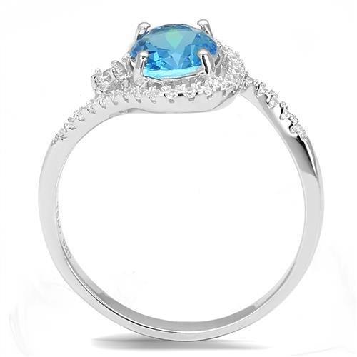 The Sky Bloom Ring – Oval Light Blue Spinel with Asymmetric Halo Loop & Floral Accent in Polished Rhodium-Plated Sterling Silver Lysandra Luxe