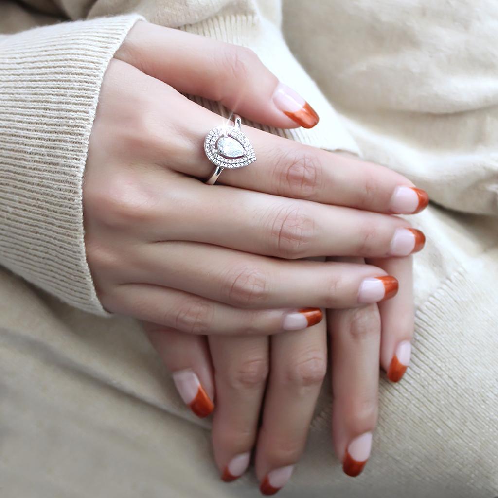 The Celestial Halo Ring – Pear-Shaped Clear CZ with Double Halo in Rhodium-Plated Brass Lysandra Luxe