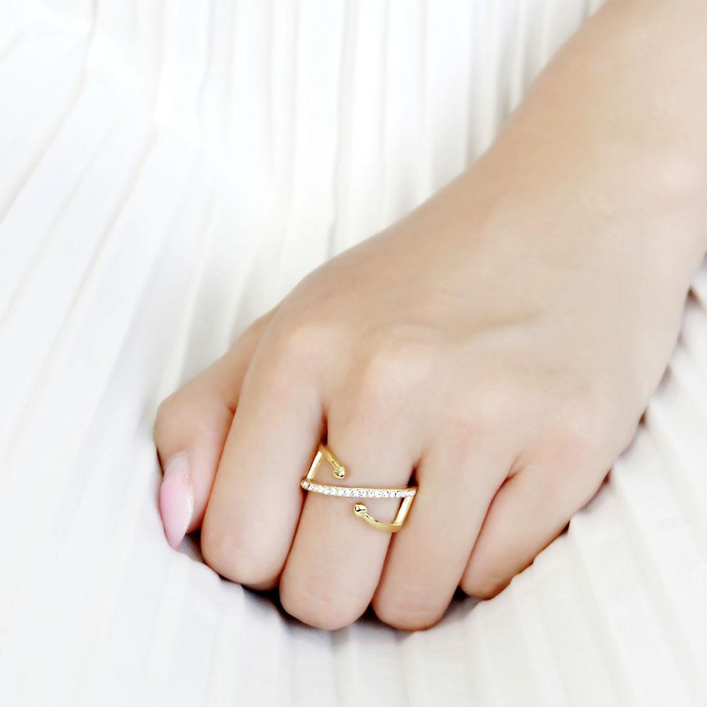 The Heart’s Cross Ring – Gold Criss-Cross Design with Heart Accents & Clear Crystals on Stainless Steel Lysandra Luxe