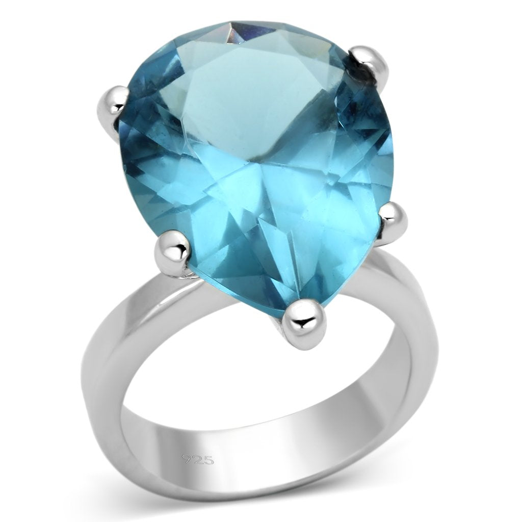 The Ocean Tear Ring – Large Pear-Shaped Sea Blue Stone in Polished Rhodium-Plated Sterling Silver Lysandra Luxe